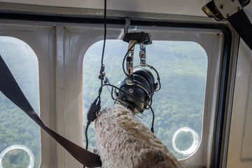 Plane Radio Headphones hanging in a small plane over Fraser Island
