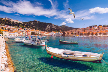 View at amazing archipelago with fishing boats in front of town Hvar, Croatia. Harbor of old...