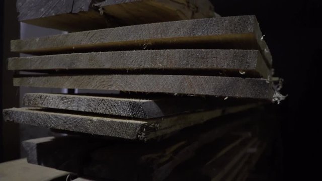 pile of old drying lumber pine self employed carpenter woodwork wood workshop