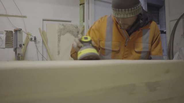 self employed carpenter woodwork wood sanding sander workshop motion gimbal 