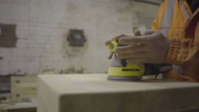 self employed carpenter woodwork wood sanding sander workshop motion gimbal 