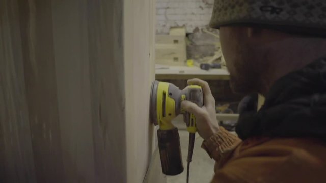 self employed carpenter woodwork wood sanding sander workshop motion gimbal 