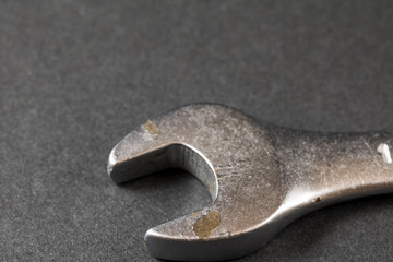 A cheap wrench showing some deterioration
