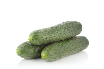 three cucumber on a white background