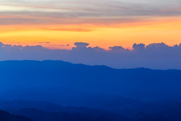 Fototapeta na wymiar landscape sunset Background of mountain in Chiang Rai,Thailand