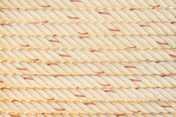 Row of white or brown rope with red seamless striped patterns texture for background
