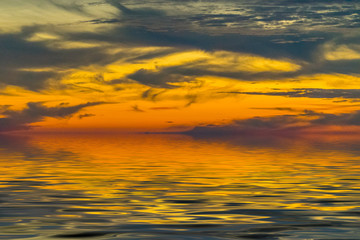 landscape from a height overlooking the sea and a bright sunset.