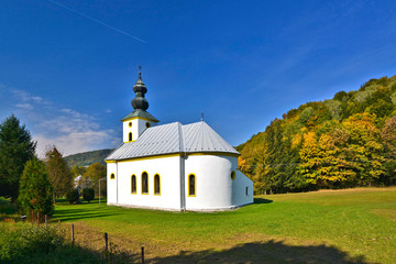 White country church in autumn, Mala Polana, Slovakia © Jurek Adamski
