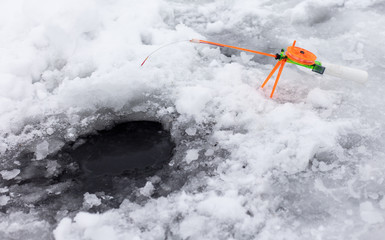 Small fishing pole for ice fishing in winter