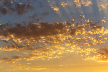 Clouds in the sky at sunset as a background