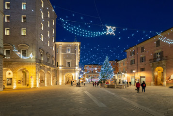Fototapeta na wymiar Rieti (Italy) - The historic center of the Sabina's provincial capital, under Mount Terminillo with snow and crossed by the river Velino, during the Christmas holidays