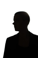 Silhouette of beautiful bald girl on white background 
