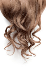 Naklejka premium Natural wavy brown hair on white background