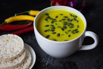 Pumpkin asian coconat cream soup. Autumn hot food