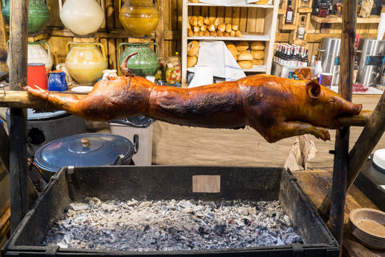 Spit roast piglet on christmas market Budapest