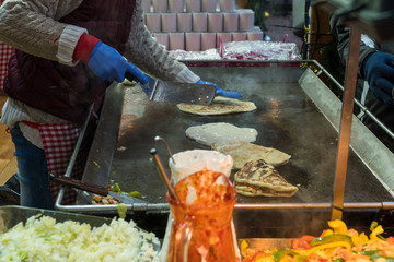 Budapest Christmas Market traditional street food.Fried dough, very tasty