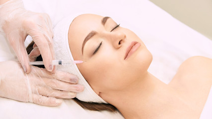 Anti wrinkle surgery. Beauty young woman injection. Facial treatment
