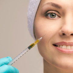 Facial injecting treatment. Skin platelet. Prp rich plasma injection. Beauty woman. Doctor gloves