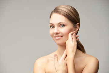 Obraz na płótnie Canvas Beauty natural portrait. Facial skincare model. Fresh elegant women face. Cosmetology treatment