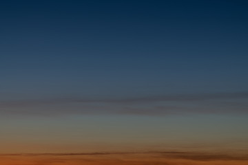 Sky gradient from blue to orange sunset