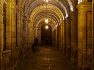 Arcade of the Raxoi Palace in dim light - Santiago de Compostela, Galicia, Spain