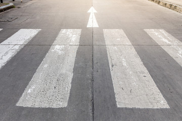 Arrow symbol and crosswalk