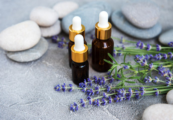 Fototapeta na wymiar Essential oil with fresh lavender