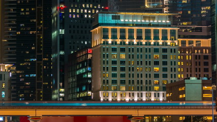 Downtown Dubai towers night timelapse. View of Sheikh Zayed road with skyscrapers.