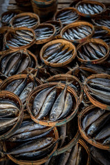 Round baskets of steamed fish stacked on top of each other