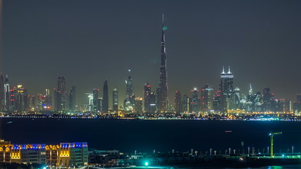 Skyline of Downtown Dubai at night timelapse.