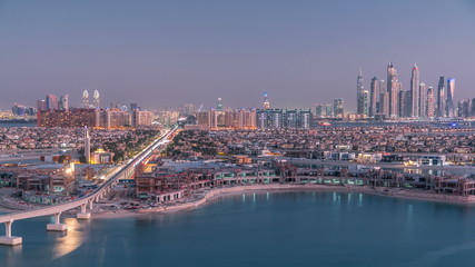 Jumeirah Palm island skyline day to night timelapse in Dubai, UAE.
