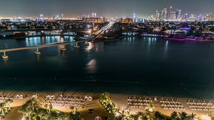 Fototapeta na wymiar Jumeirah Palm island skyline night timelapse in Dubai, UAE.