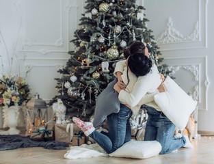 Naklejka premium Portrait of two beautiful young girls is in Christmas sceneries