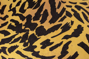 Motif tigré jaune et noir texture cuir Arrière plan de peau de tigre ressource graphique détail...