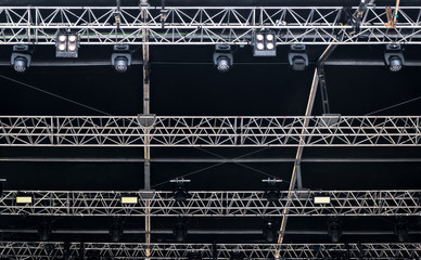 stage lights and console on black background
