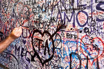 Wall full of lovers wishes at house of Juliet Capulet in Verona in Italy / Writings on a wall 