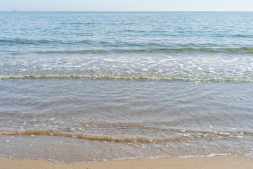 View of the sea from the beach on a spring day