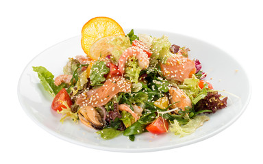 Salad with salmon and seafood. On a white background