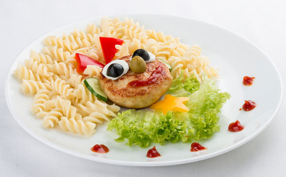 Children's Menu. Chicken Cutlet With Pasta And Salad. On A White Background