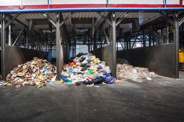 Separate garbage collection and waste sorting at the treatment processing plant. Recycling separate...