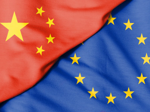 Two flags. Flag of China. European Union flag.