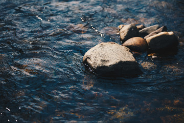 round stones in the river