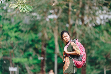 Traveler backpacker asian woman with nature background , concept travel , copy space