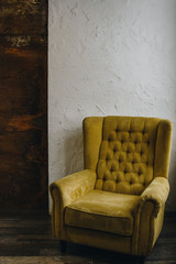 Yellow chair in loft studio