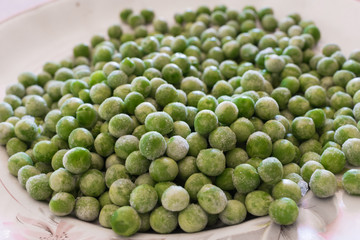 close-up of frozen green peas