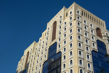 Beautiful hotel building with semi-circle windows