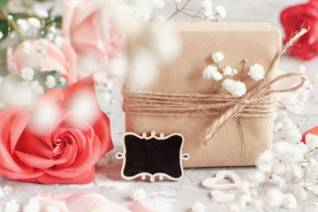 Gift bags, small chalkboard and flowers