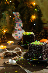 Sweet cakes on the festive wooden table