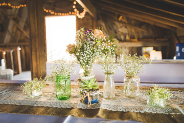babies breath flowers in mason jars and vases