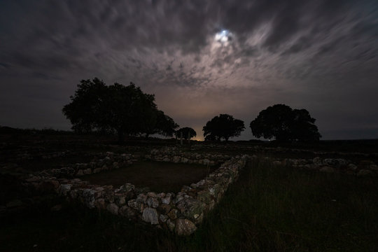 Night landscape with Roman ruins. Ancient Roman villa of Los Terminos in Monroy. Extremadura. Spain.